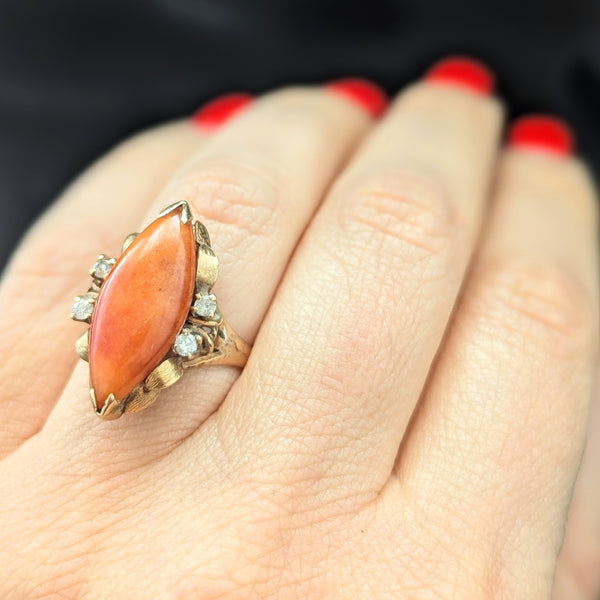 1940s Vintage Coral Diamonds 14k Yellow Gold Navette Cocktail Ring Retro Estate on hand close up
