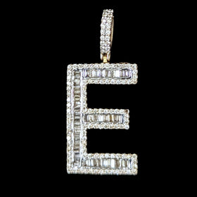 Diamond-studded letter 'E' pendant on a black background