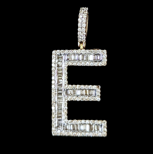 Diamond-studded letter 'E' pendant on a black background