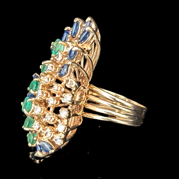 Gold ring with gemstones on a black background